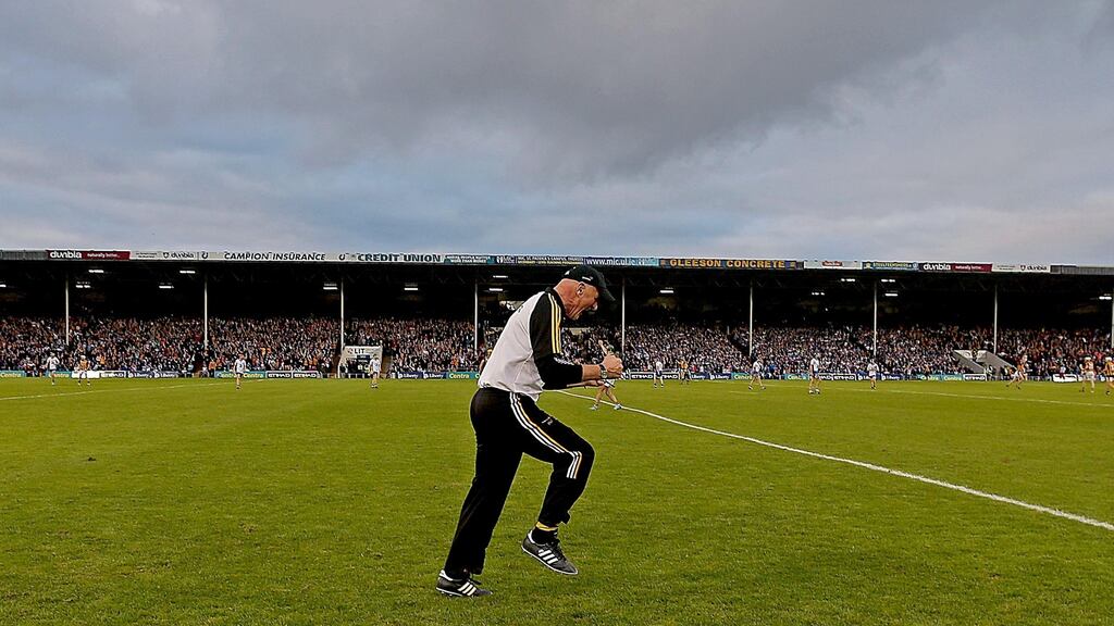 Kilkenny manager Brian Cody celebrates in the closing stages of the All-Ireland semi-final replay against Waterford at Semple Stadium in Thurles. Photograph: Donall Farmer/Inpho