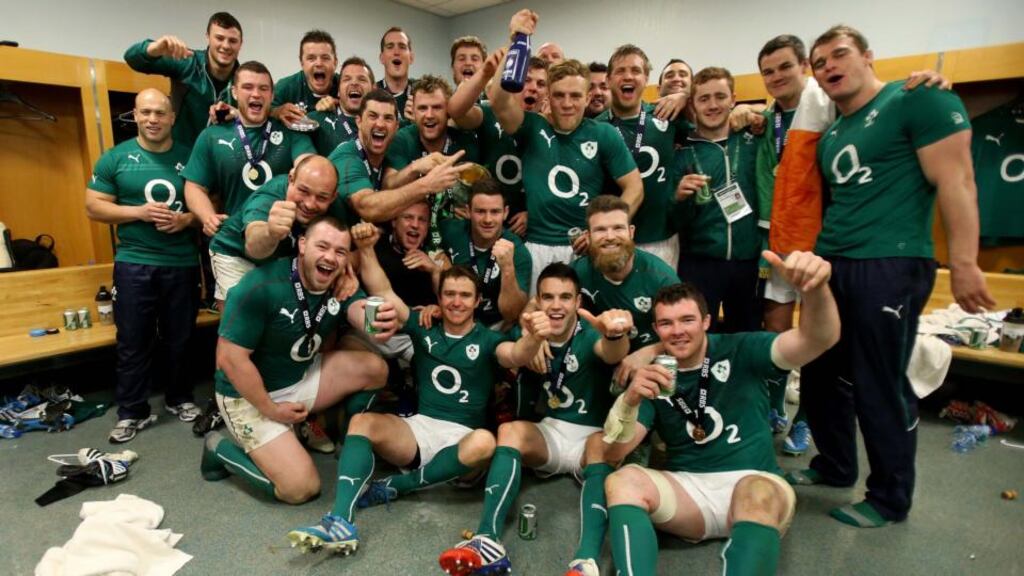 The Ireland team celebrate winning the RBS Six Nations Championship in the dressing room of the Stade de France. Photograph: INPHO/Dan Sheridan