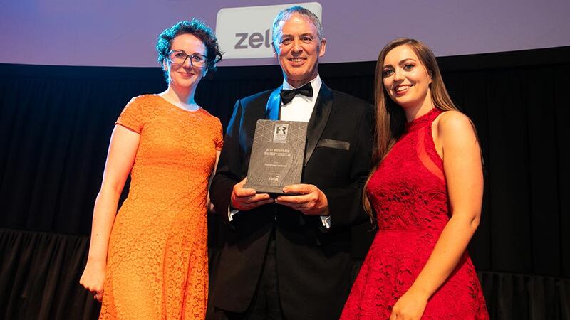 Simon Garvey, Sales Director and Country Manager, Zellis, presents the Best Workplace Diversity Strategy award to Aoife Mulqueen & Jennifer Kavanagh, Vodafone Ireland.