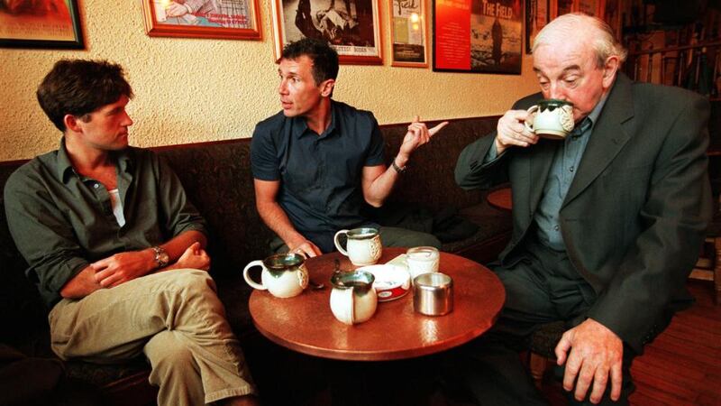 Authors Michael Collins and Michael Cunningham and playwright John B Keane in the latter’s bar during Listowel Writers’ Week in 2000. Photograph: Frank Miller