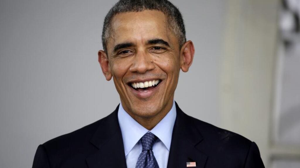 Mr Kenny’s visit coincided with media reports that said US president Obama was planning to take executive action, bypassing Congress, to lift the threat of deportation over as many as five million of the estimated 11 million people living illegally in the country. Photograph: Nyein Chan Naing/EPA