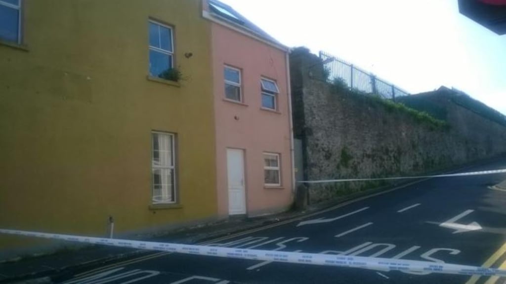 The scene outside the house in Limerick where the body of a man was discovered early on Wednesday morning. Photograph: Kathryn Hayes