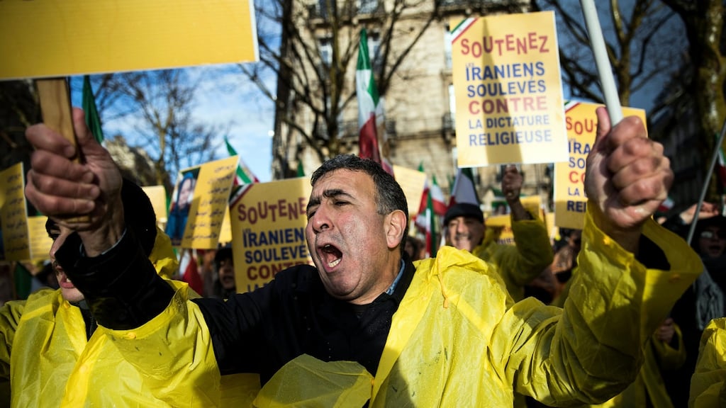 Dozens of protesters demonstrate against the Iranian regime and in support of the Iranian anti government demonstrators near the Iranian embassy in Paris, France. Photograph: Etienne Laurent/EPA