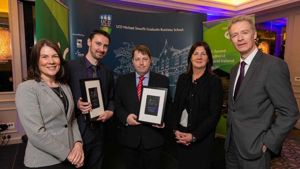 Irish Times journalists Mark Paul and Ciarán Hancock, who  won the business news story of the year award at the UCD Michael Smurfit Graduate Business School, 11th Annual Business Journalist Awards for an article on the boardroom row at Independent News and Media (INM) over its proposed bid for radio station Newstalk are pictured with (from left) Eavann Murphy, director of sales services and marketing at sponsor Open Eir; Emer Gilvarry, chairwoman awards judging panel and chairwoman of  Mason Hayes & Curran; and  Prof Mike O’Neill, associate dean and director of  UCD Smurfit School. Photograph: Shane O’Neill /  SON Photographic