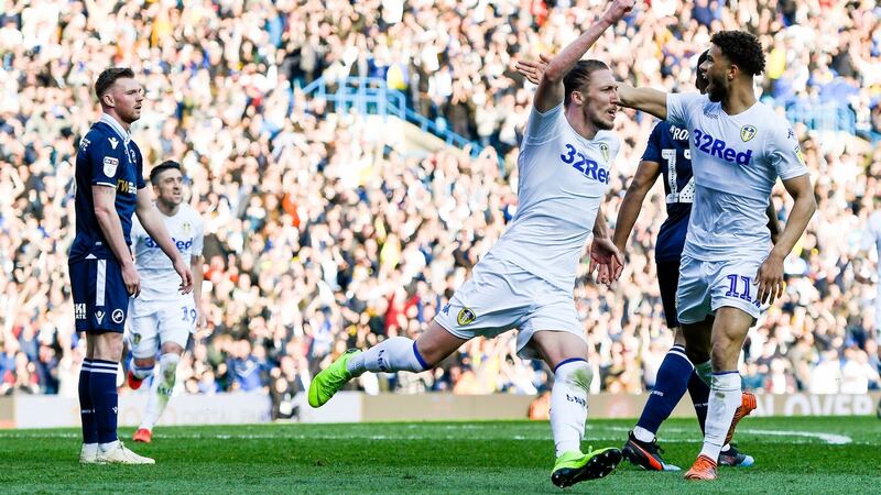 Luke Ayling celebrates scoring Leeds United’s second goal during the Championship match against Millwall at Elland Road. Photograph: George Wood/Getty Images