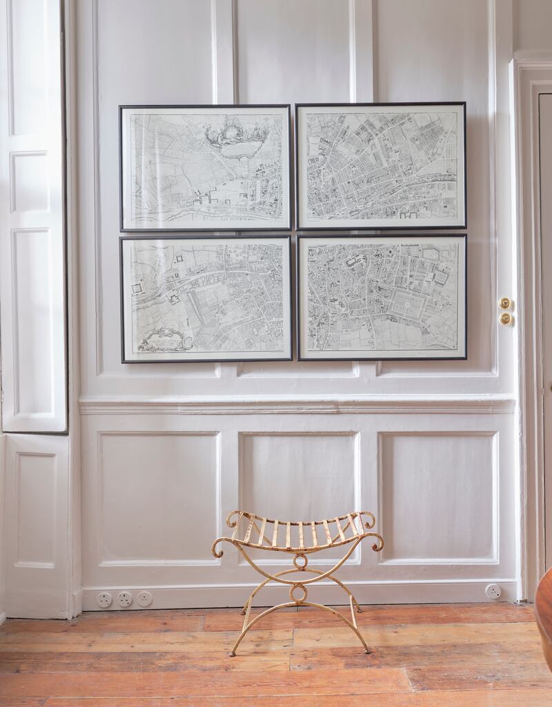 Antique maps of Ireland, in simple black frames, grouped together for greater impact.