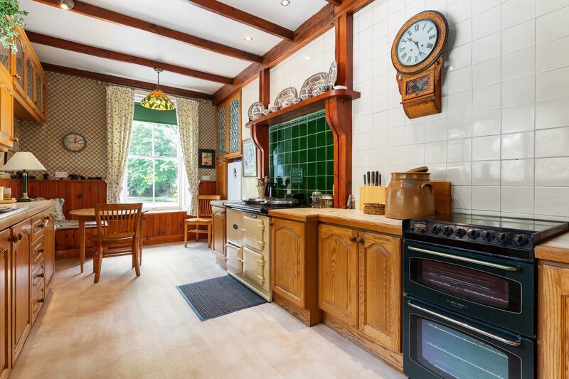 Kitchen with stove and breakfast nook