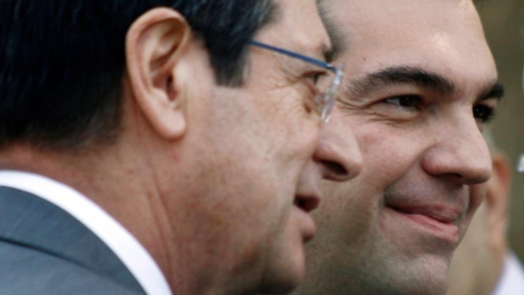 President of Cyprus Nikos Anastasiadis (left) welcomes new Greek prime minister Alexis Tsipras in Nicosia on Monday. The euro zone “would be maimed without Greece and Cyprus”, said Mr Tsipras. Photograph: Katia Christodoulou/EPA