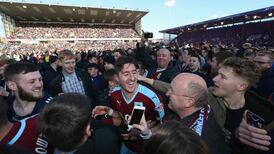 Stephen Ward celebrates quietly as Burnley win promotion