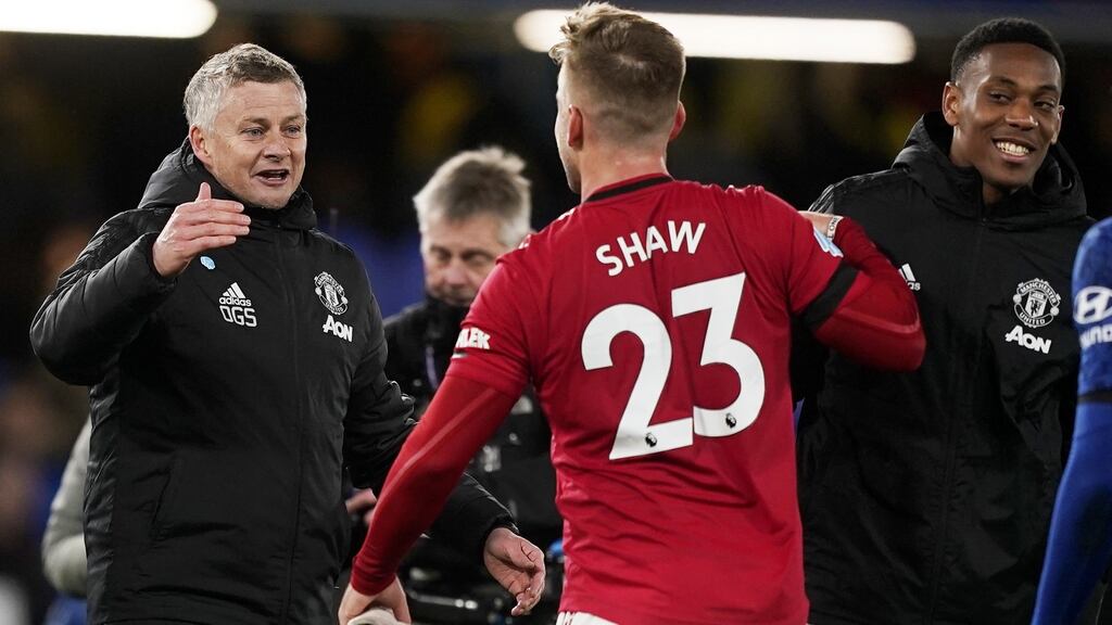 Ole Gunnar Solskjær celebrates with his players after their Premier League win over Chelsea. Photo: Will Oliver/Getty Images