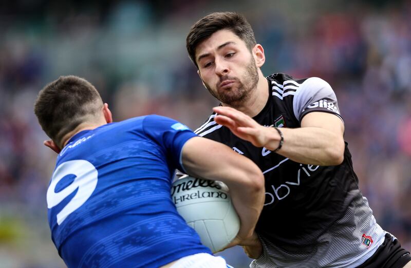 Cavan's James Smith and Sligo's Nathan Mullen in a Tailteann Cup semi-final in Croke Park in June 2022. Photograph: Evan Treacy/Inpho
