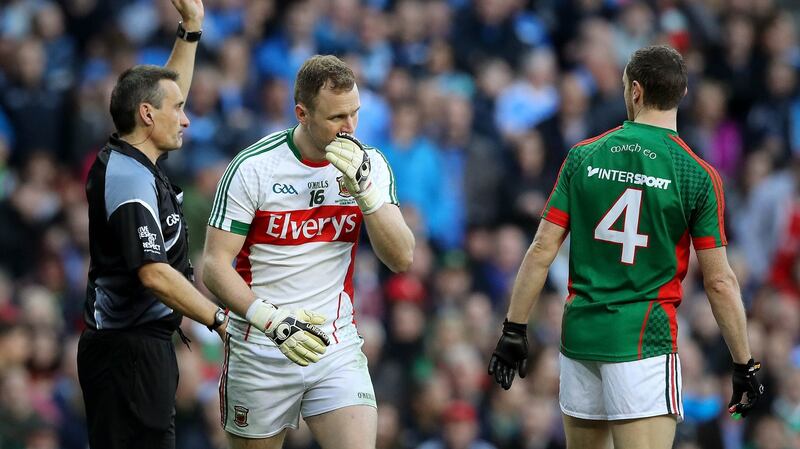 Mayo goalkeeper Robert Hennelly is black-carded by referee Maurice Deegan during last year’s All-Ireland final replay against Dublin. Photograph: Ryan Byrne/Inpho