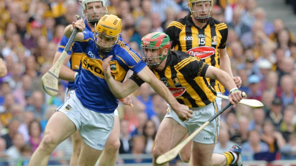 Kieran Bergin battles past Kilkenny’s Eoin Larkin in last year’s replayed All-Ireland final. Photograph: Alan Betson