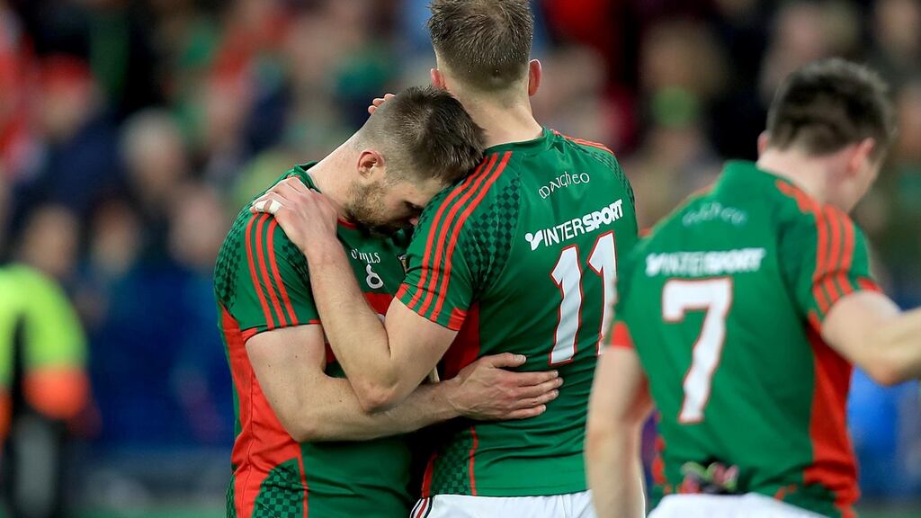 Brothers Séamus and Aidan O’Shea of Mayo show their dejection following Mayo’s agonising one-point defeat to Dublin  at Croke Park. Photograph: Donall Farmer/Inpho