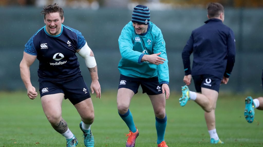 Andrew Porter and Jonny Sexton sharing a light-hearted moment during Ireland’s squad training session at Carton House. Photograph: Dan Sheridan/Inpho