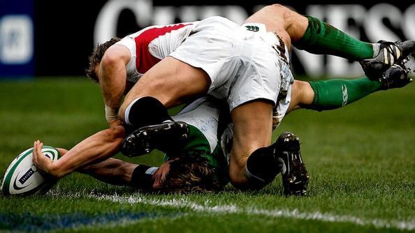 Josh Lewsey gets the ball away under pressure from Brian O'Driscoll in the Six Nations match between Ireland and England, at Croke Park in 2007. photograph: eric luke/the irish times