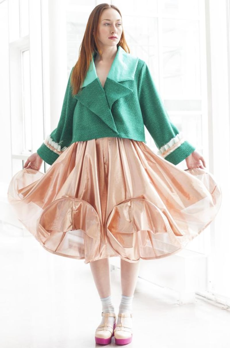 Hannah Moran: green boucle and distressed leather jacket with lame skirt