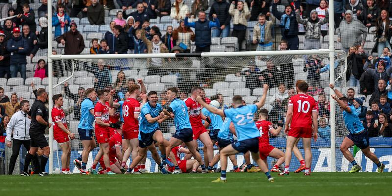 Dublin players celebrate Greg McEneaney’s goal to send the game to penalties. Photograph: James Crombie/Inpho