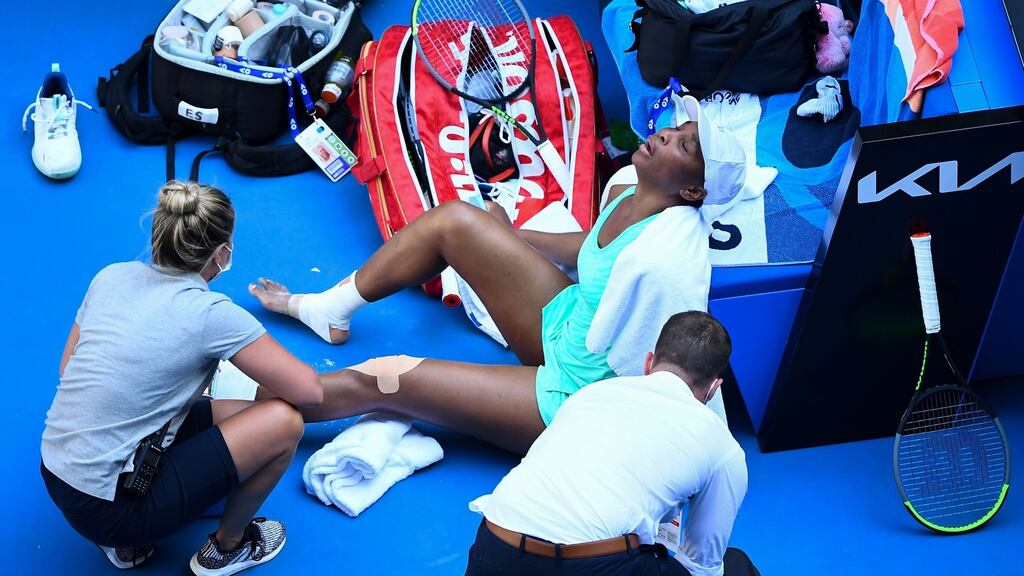 Venus Williams of the US receives medical attention during her Australian Open women’s singles match against Italy’s Sara Errani, in Melbourne. Photograph: William West/AFP via Getty Images