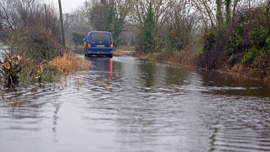 A flooded road in Clondra, Co Longford. The Department of Transport has put €106 million aside for emergency repairs to hundreds of roads damaged by bad weather in February. Photograph: Eric Luke/The Irish Times