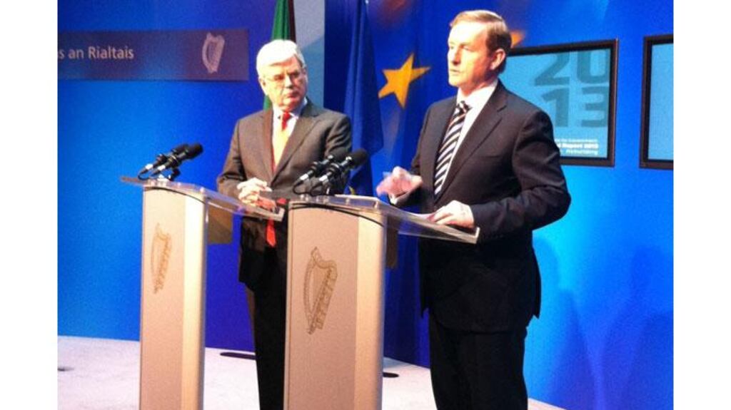 Tanaiste Eamon Gilmore and Taoiseach Enda Kenny marking the Coalition's second year in office. Photograph: Bryan O'Brien/The Irish Times