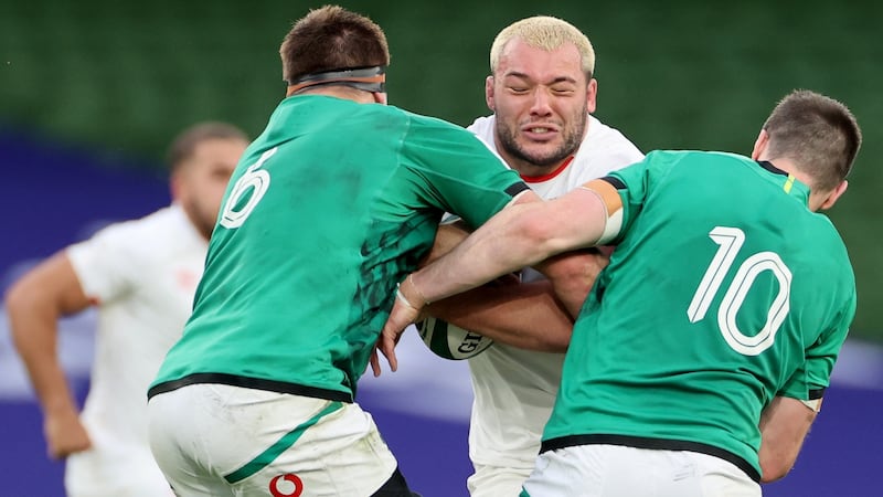 Ellis Genge is tackled by CJ Stander and Johnny Sexton during last year’s Six Nations clash at the Aviva Stadium. Photograph: James Crombie/Inpho