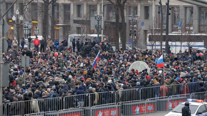 People gather in a square during the rally in Moscow on Sunday. Photograph: Reuters