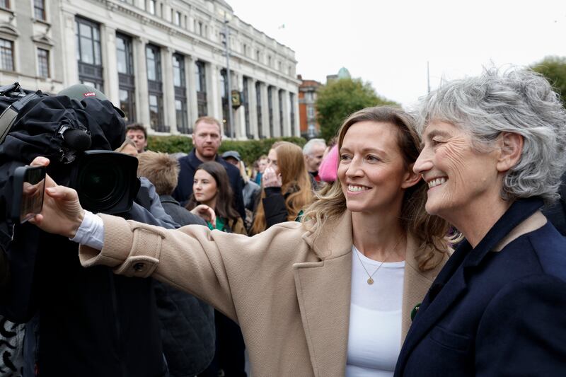 Holly Cairns, leader of the Social Democrats, takes a selfie with Connolly on O'Connell Street. Photograph: Conor O'Mearain/PA Wire