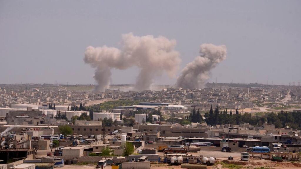 Smoke rises  near Aleppo.Photograph: George Ourfalian/Reuters