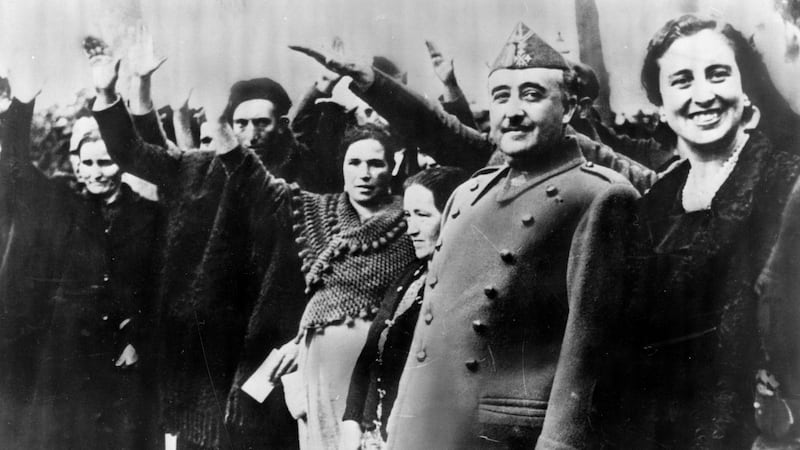 General Franco and his wife being saluted. Photograph: Keystone/Getty Images