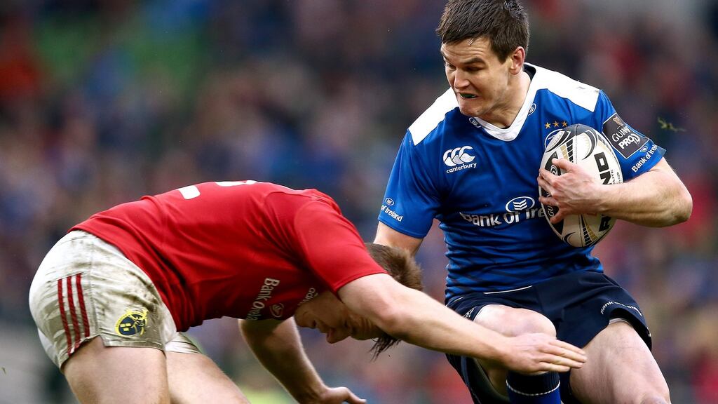 Munster’s Rory Scannell tackles Leinster outhalf Johnny Sexton at the Aviva Stadium on Saturday. Photograph: James Crombie/Inpho.
