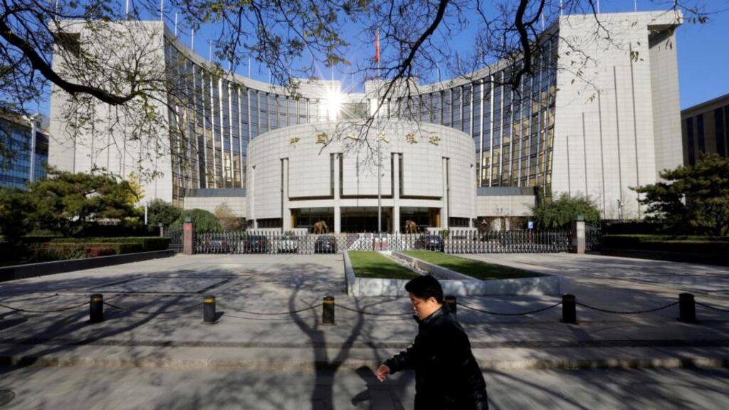 The People’s Bank of China in Beijing. China’s bank lending in August more than doubled from the previous month. Photograph: Jason Lee/Reuters