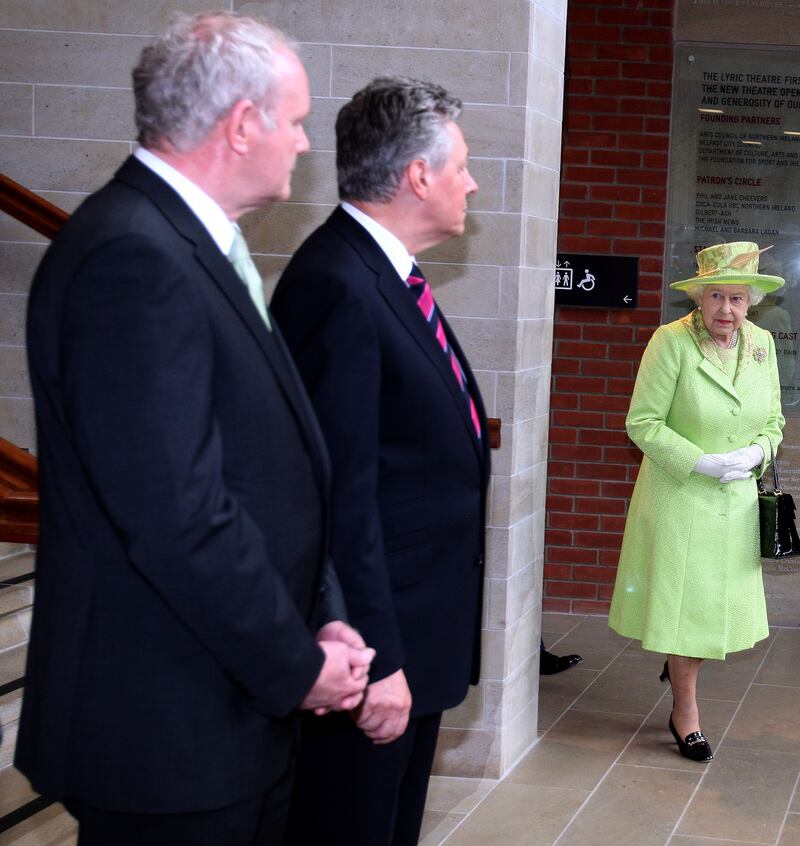 Handshake: Martin McGuinness and Peter Robinson wait to meet Queen Elizabeth in 2012. Photograph: Paul Faith/WPA Pool/Getty