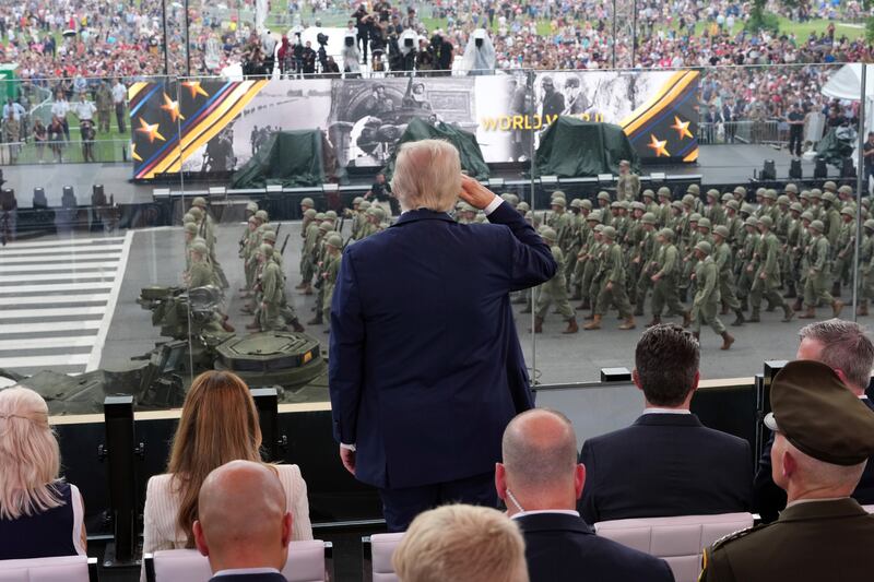 President Donald Trump salutes the troops marching past during the US army's 250th Anniversary Parade along the National Mall in Washington, DC. Photograph: Doug Mills/The New York Times