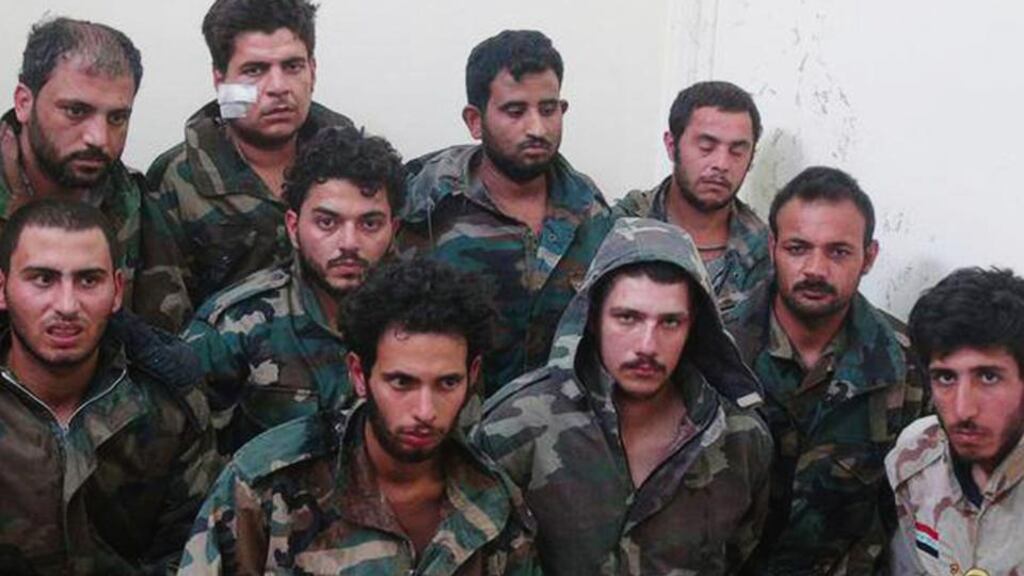 This picture released today by a militant website which had been verified shows Syrian government soldiers captured by Islamic State militants in the Palmyra area of Syria. Photograph: militant website via AP