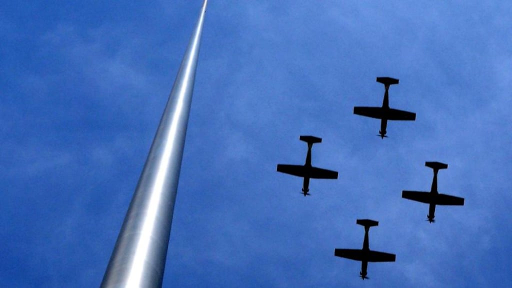 The Air Corps fly past the Millennium Spire during the 1916 Easter Sunday Commemoration Ceremony at the GPO in Dublin last year. Photograph: Brenda Fitzsimons/The Irish Times.