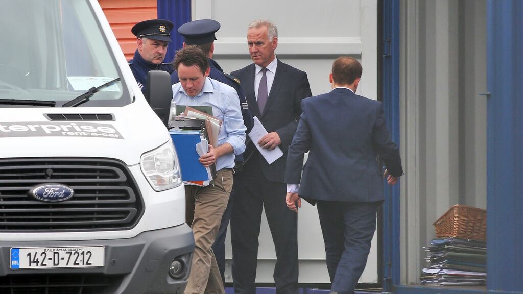 Documents relating to the suicide bereavment counselling charity, Console are removed from a storage container in Tougher Business Park, Kildare. Photograph: Colin Keegan, Collins Dublin.