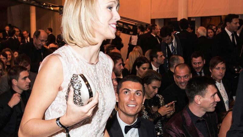 Republic of Ireland player Stephanie Roche with Cristiano Ronaldo and Lionel Messi at the Fifa Ballon d’Or awards in Zurich. photograph: Andreas Meier/Inpho