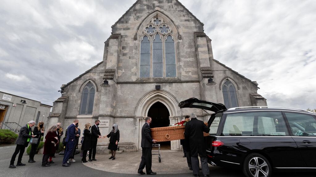 The remains of Shay Healy are carried into the Victorian Chapel, Mount Jerome, Dublin. Photograph: Colin Keegan/Collins Dublin