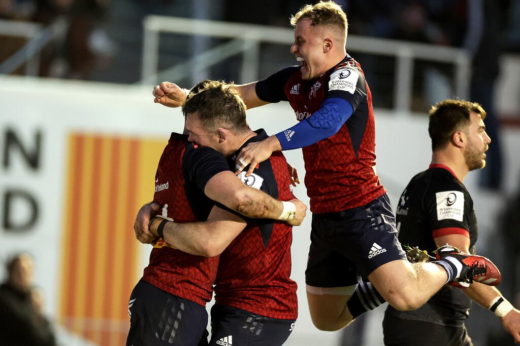 Munster's Calvin Nash celebrates scoring a try with Peter O'Mahony and Craig Casey during the win over Toulon. Photograph: Laszlo Geczo/Inpho