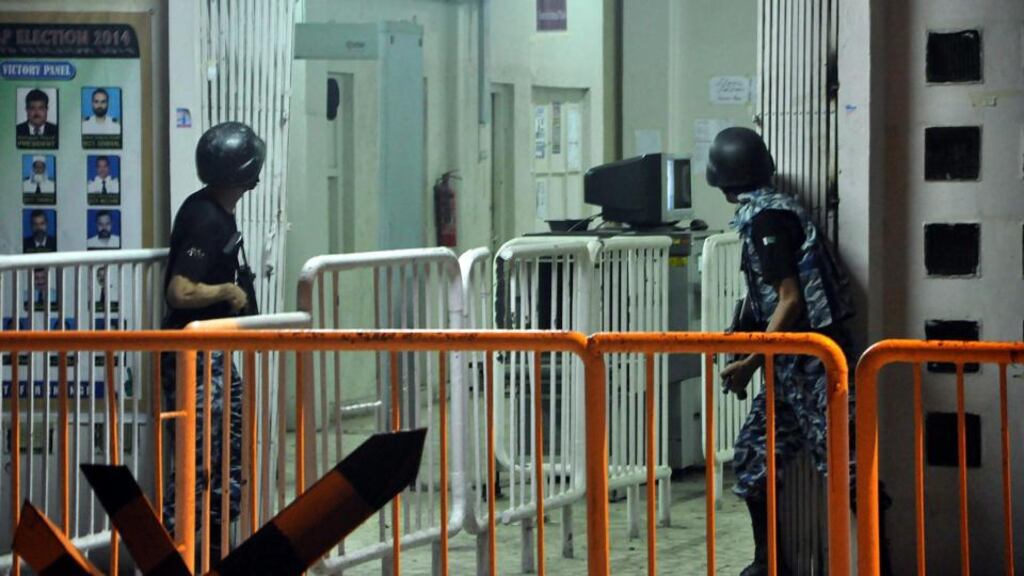 Pakistani security officials take positions after suspected militants attacked Jinnah International Airport in Karachi, Pakistan. Photograph: Shahzaib Akber/EPA