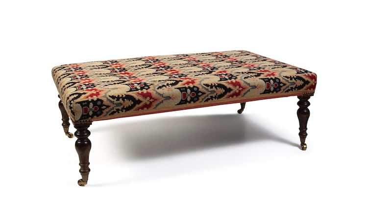 Lot 219: a late Georgian mahogany and needlework footstool on its obliging brass castors (€300-€400).