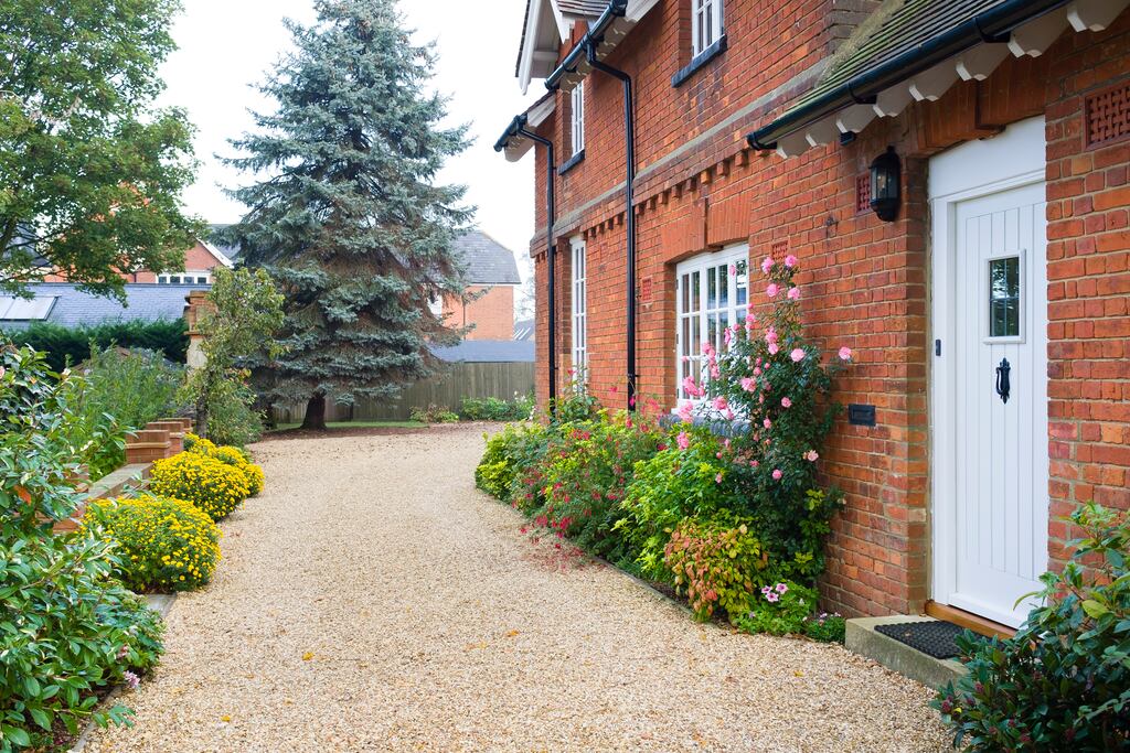 Replacing garden paving materials with more permeable options, such as gravel, can be a better option to improve drainage.
