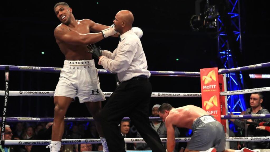 Referee David Fields steps in to stop the fight as Anthony Joshua beats Wladimir Klitschko to win the the IBF, WBA and IBO Heavyweight World Title bout at Wembley Stadium in London. Photograph: Richard Heathcote/Getty Images