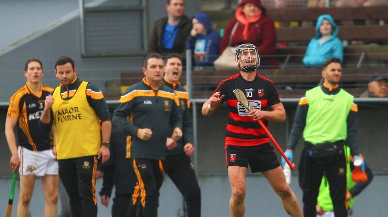 Ballygunner’s Pauric Mahony watches his shot go over the bar and the Ballyea sideline reacts during the AIB Munster Club SHC semi-final at Walsh Park. Photograph: Ken Sutton/Inpho