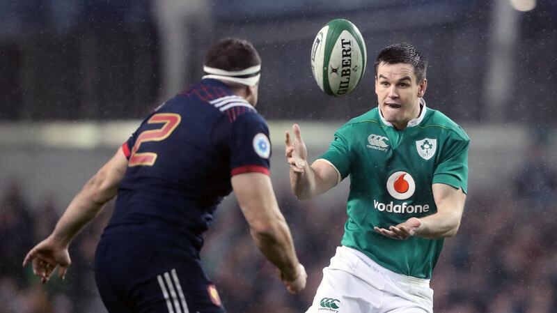 Sexton runs at France’s Guilhem Guirado. Photo: Niall Carson/PA