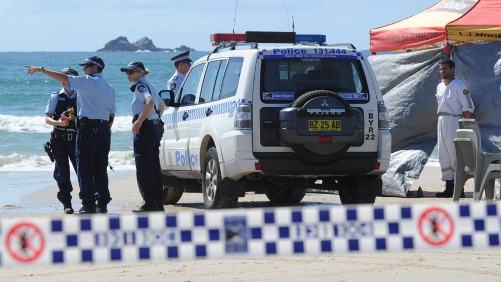 Members of the Australian Police inspect Clarkes Beach, at Byron Bay, New South Wales, Australia, after a died following a shark attack while swimming at Clarkes Beach earlier this week. Photograph: Dave Hunt /EPA