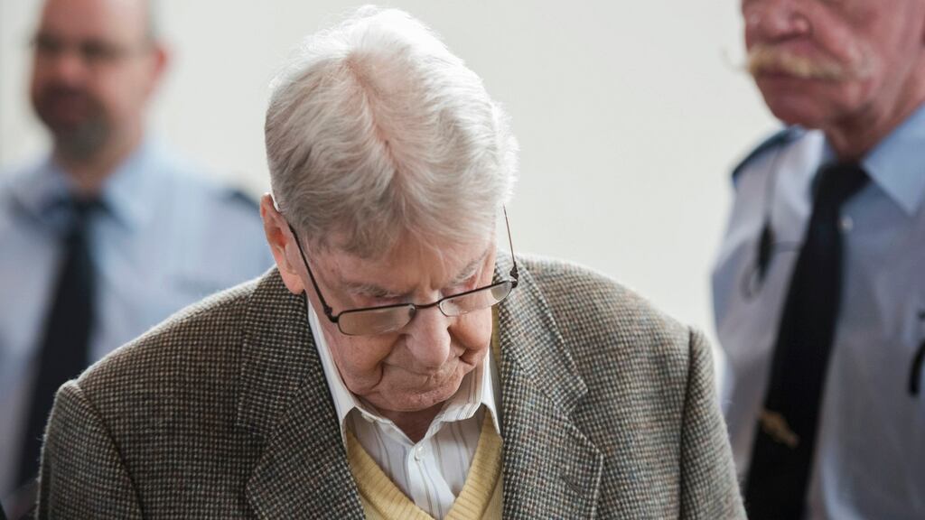 Reinhold Hanning, a 94-year-old former guard at Auschwitz arrives to the courtroom for his trial in Detmold, Germany. Mr Hanning began serving as a guard at Auschwitz when he was 22 years old. Photograph: Bernd Thissen/Reuters
