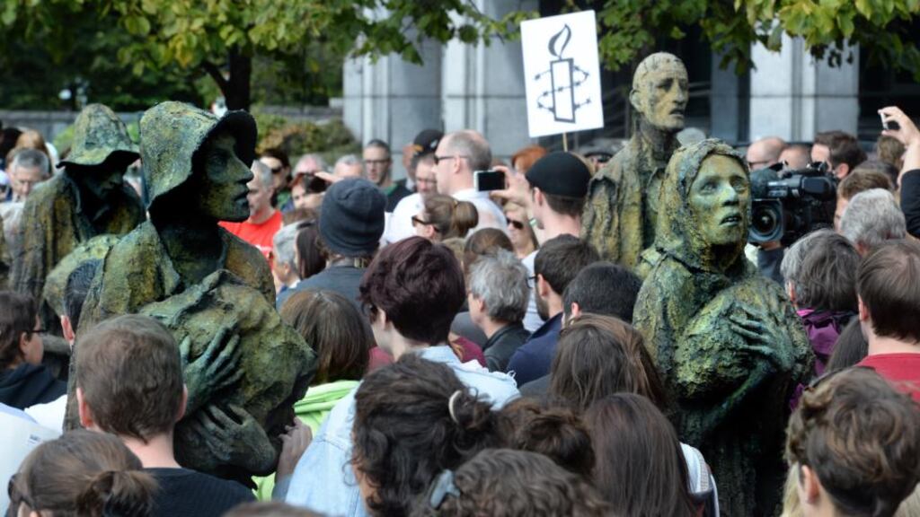 A section of the crowd gathered at the Famine Memorial on Custom House Quay in solidarity with people seeking refuge in Europe. Photograph: Cyril Byrne/The Irish Times