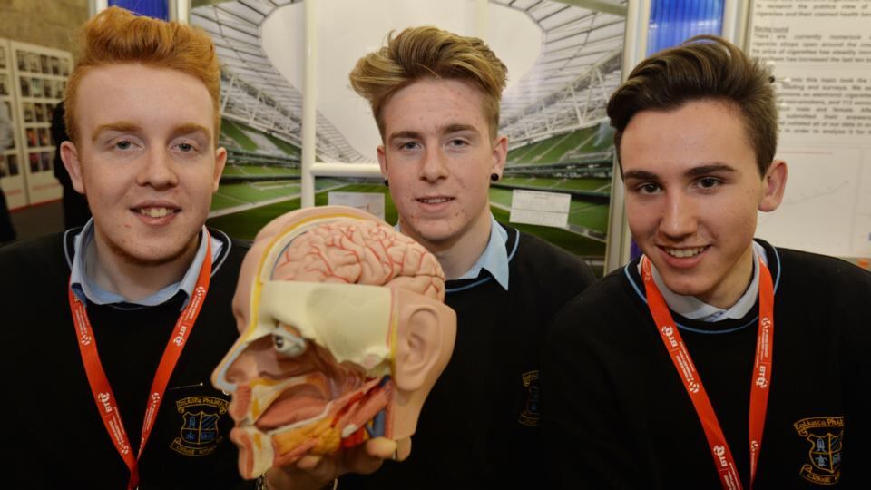 Micheal Ní Coill, Andrew Eley and David McDermott from Coláiste Phádraig  Lucan with their project Concussion Screening – to investigate if players get low pre-screening scores on purpose in order to get back on the pitch quicker at the BT Young Scientist & Technology Exhibition 2015. Photograph: Alan Betson